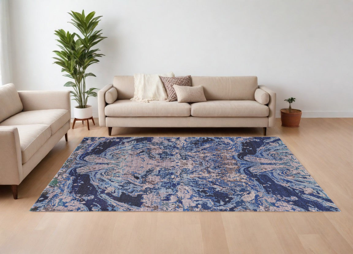 5' X 8' Blue Pink and Tan Abstract Power Loom Washable Area Rug