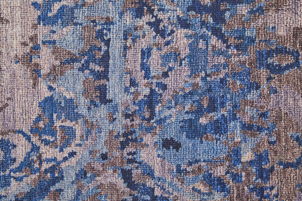 5' X 8' Blue Pink and Tan Abstract Power Loom Washable Area Rug