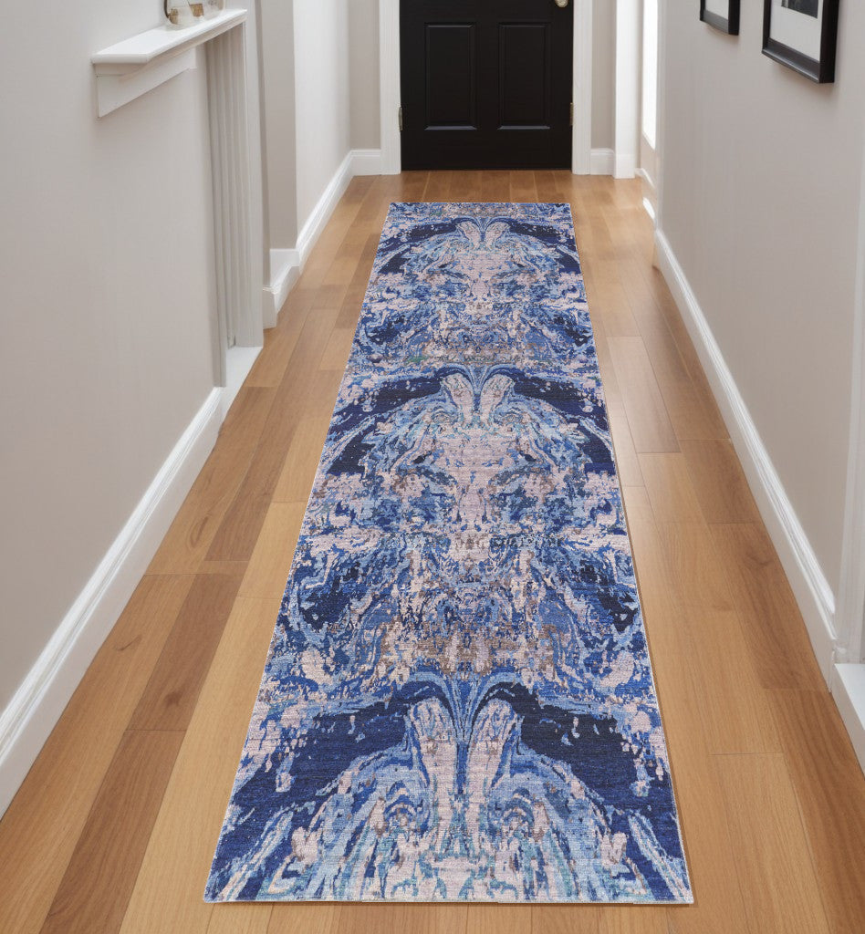 5' X 8' Blue Pink and Tan Abstract Power Loom Washable Area Rug