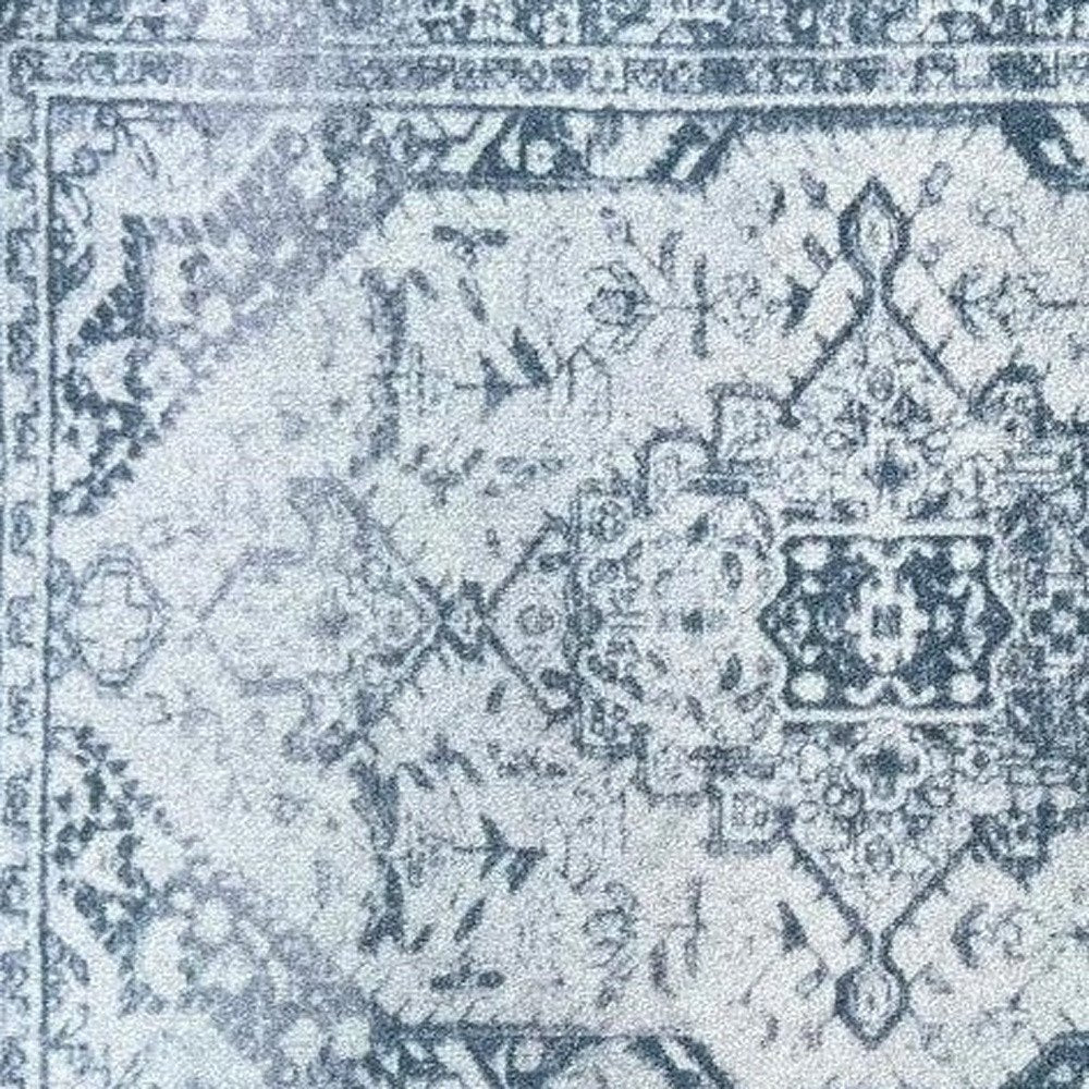 2' X 3' Dark Blue Gray And Ivory Oriental Distressed Washable Area Rug With UV Protection