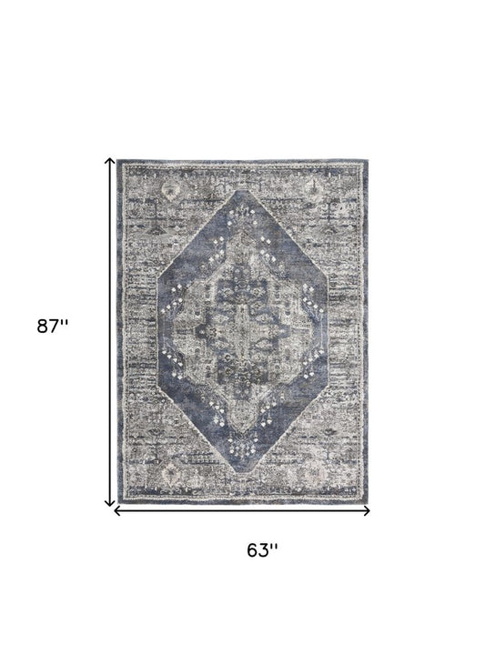 5' X 7' Blue Floral Power Loom Distressed Area Rug