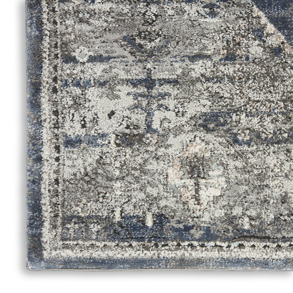 5' X 7' Blue Floral Power Loom Distressed Area Rug