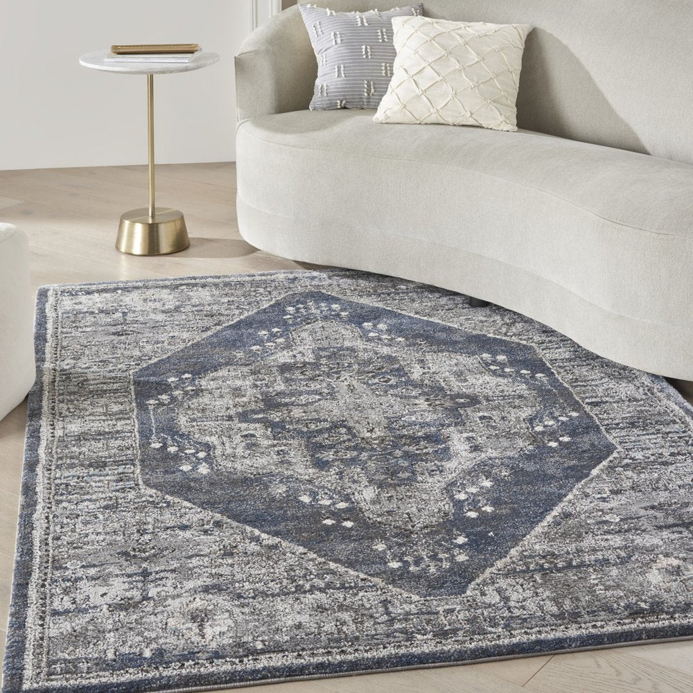 5' X 7' Blue Floral Power Loom Distressed Area Rug