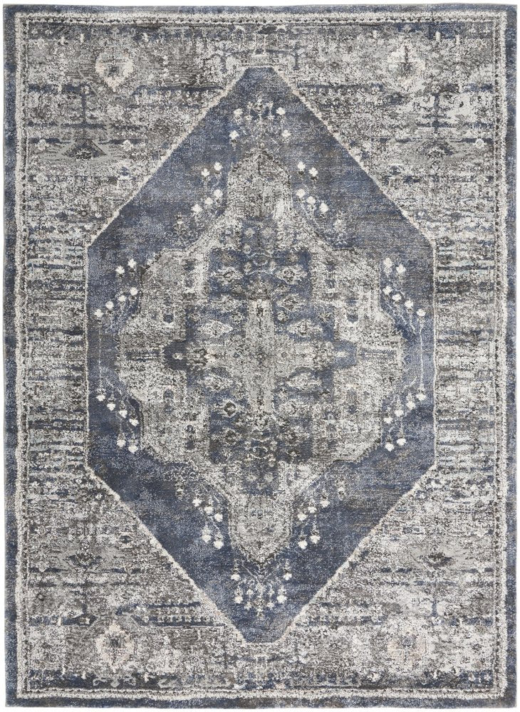 5' X 7' Blue Floral Power Loom Distressed Area Rug