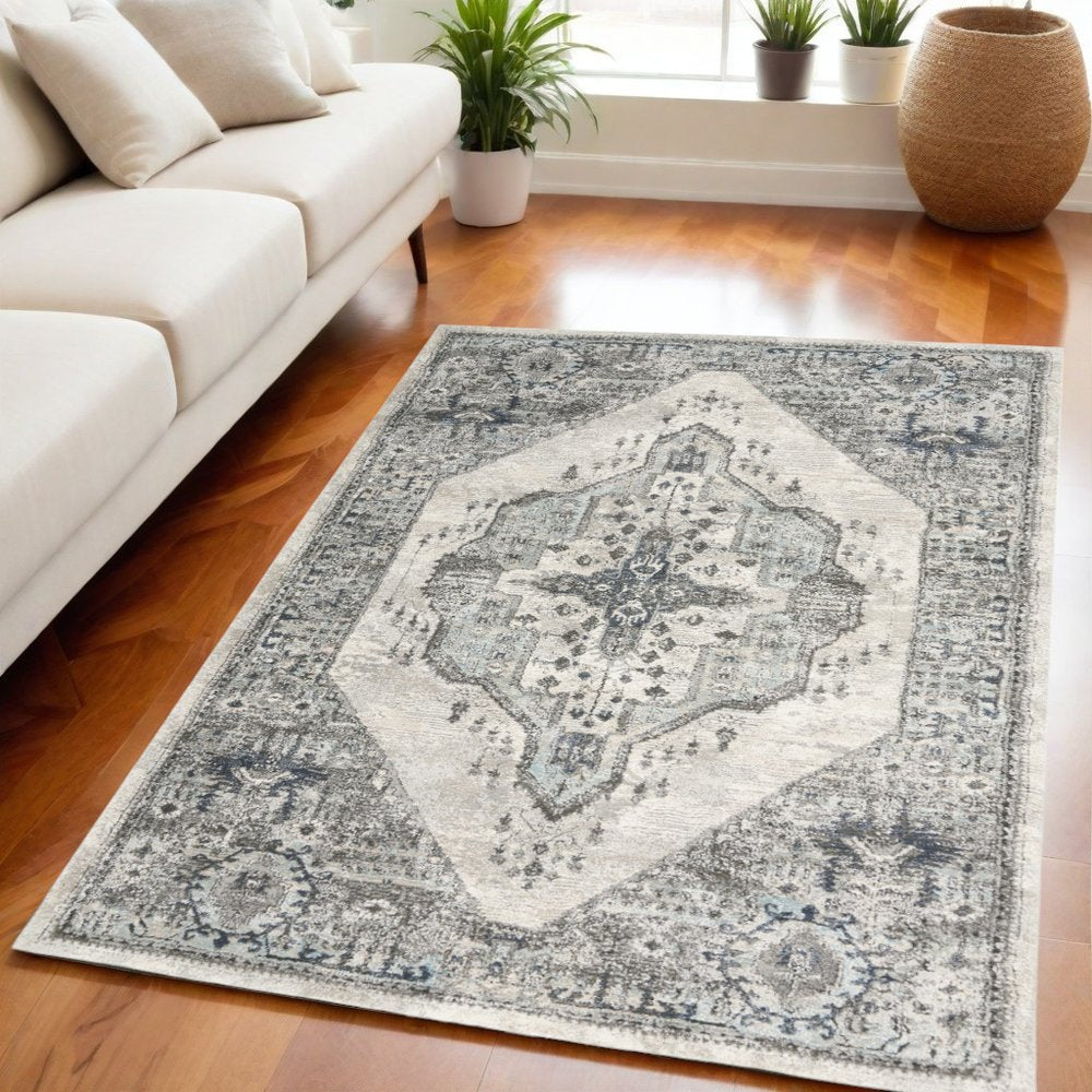 5' X 7' Gray Floral Power Loom Distressed Area Rug