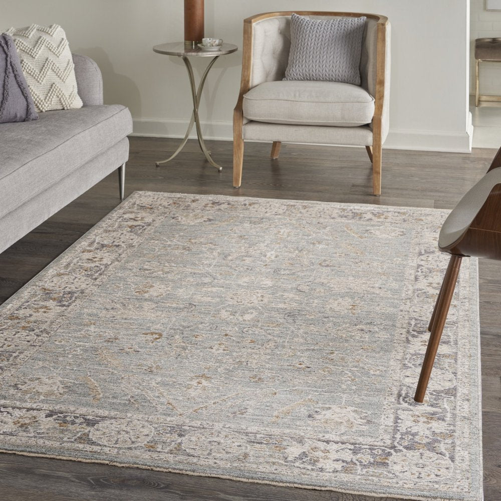4' X 6' Blue Floral Power Loom Distressed Area Rug