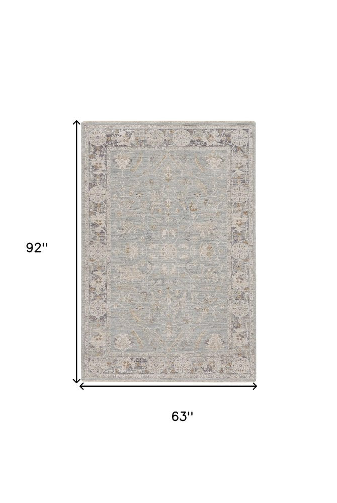 5' X 8' Blue Floral Power Loom Distressed Area Rug