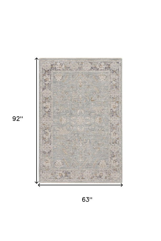 5' X 8' Blue Floral Power Loom Distressed Area Rug