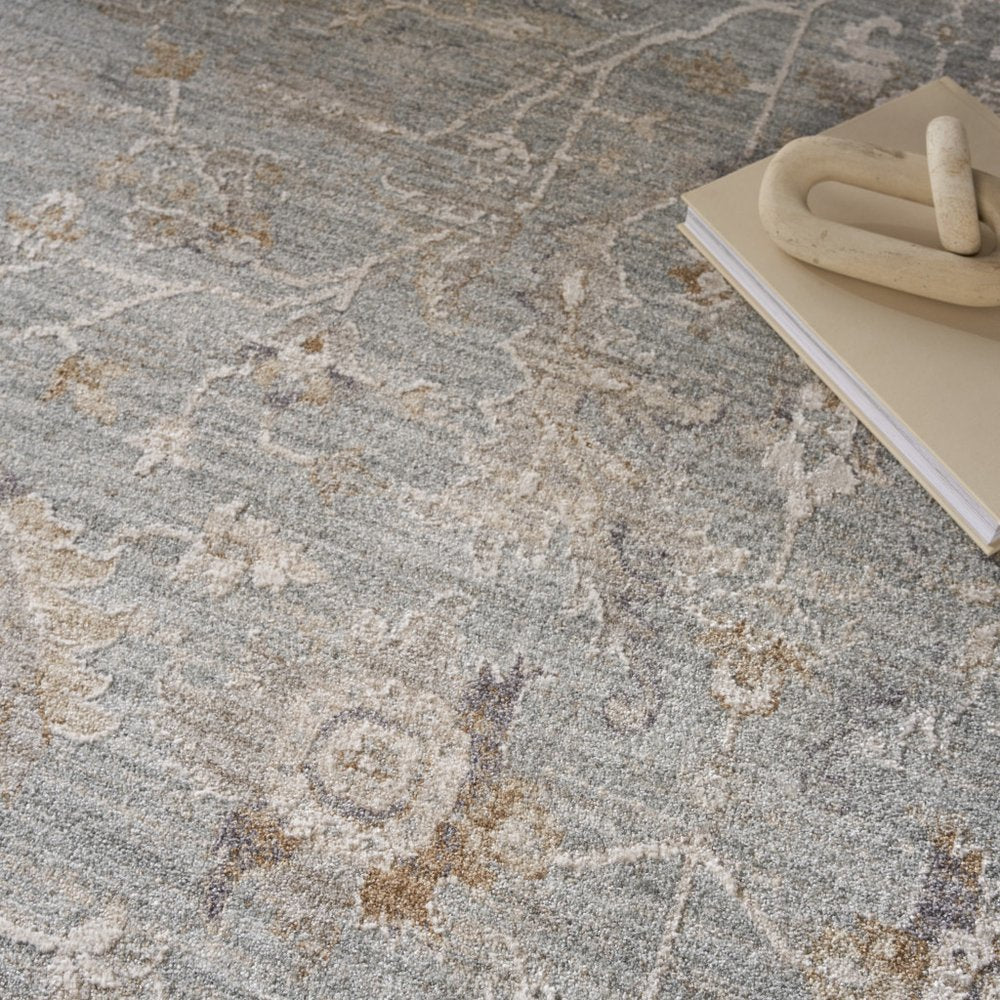 5' X 8' Blue Floral Power Loom Distressed Area Rug