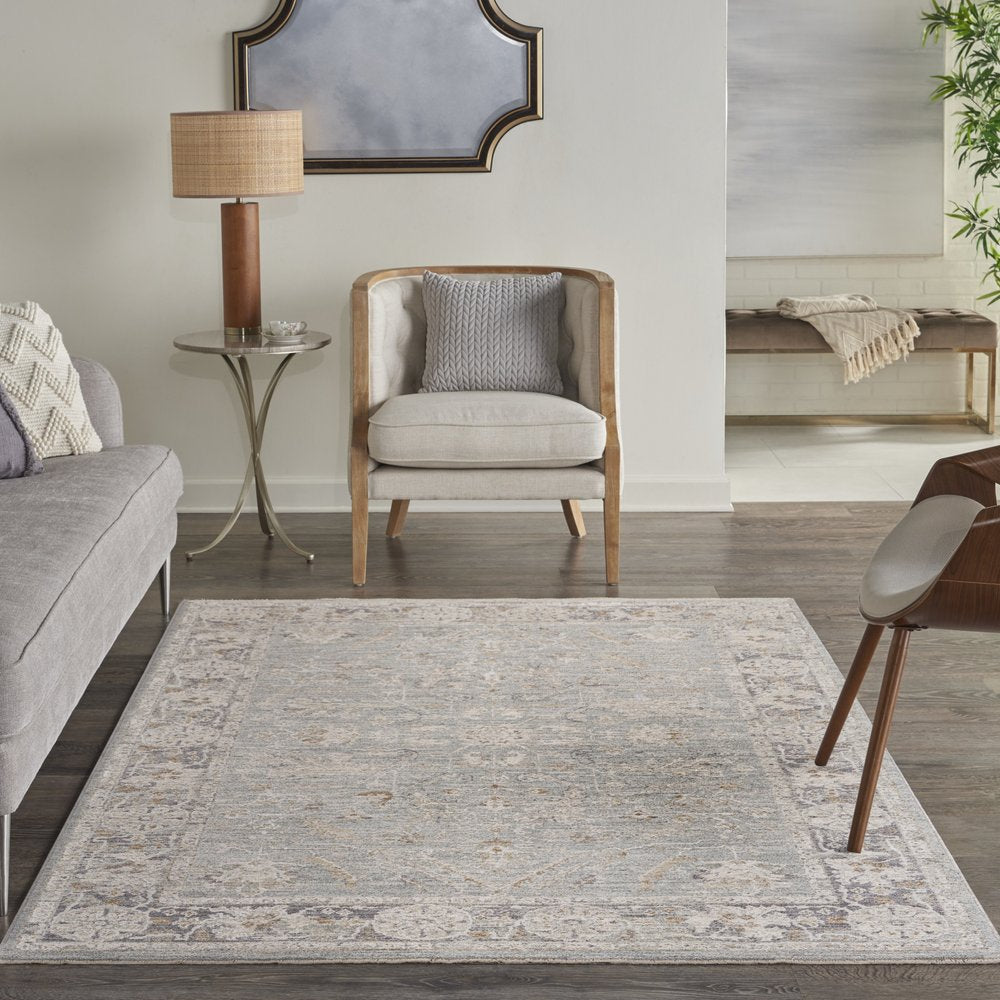 5' X 8' Blue Floral Power Loom Distressed Area Rug