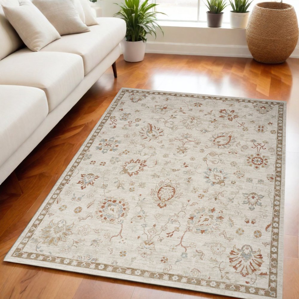 5' X 8' Ivory Floral Power Loom Distressed Area Rug