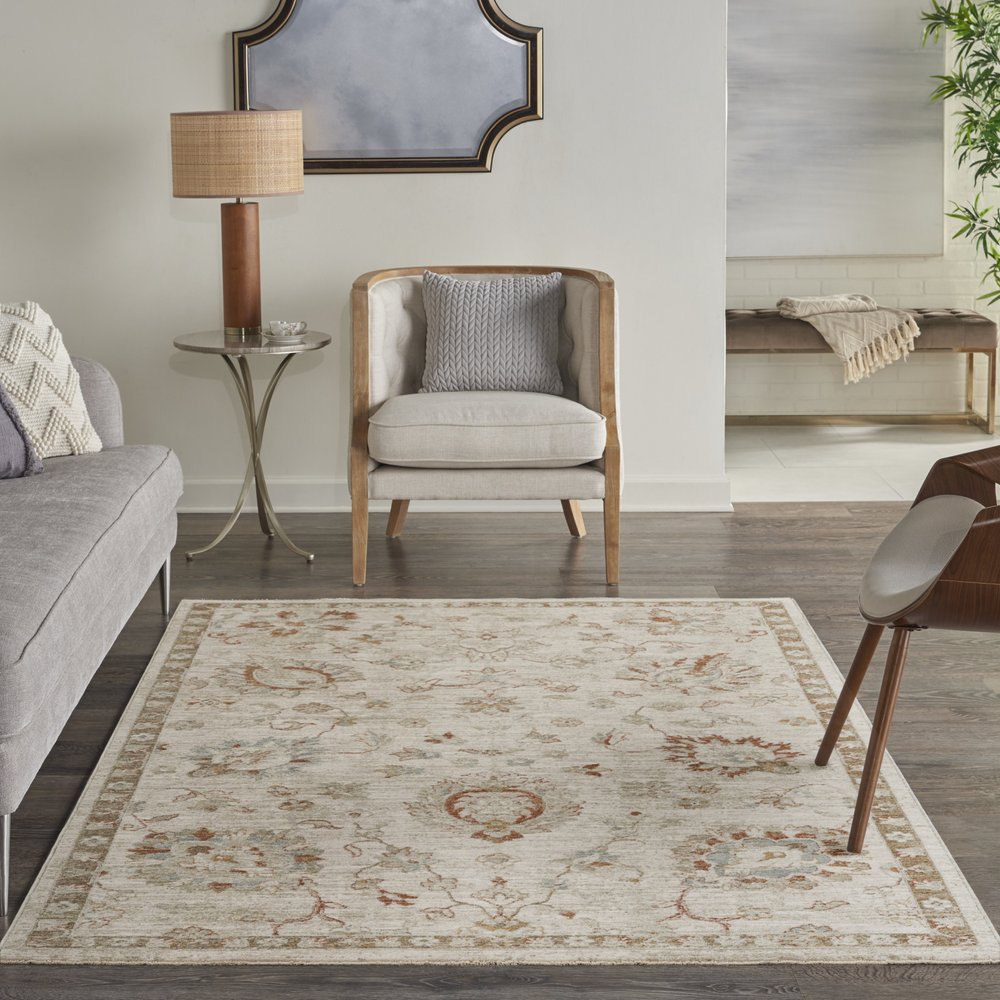 5' X 8' Ivory Floral Power Loom Distressed Area Rug