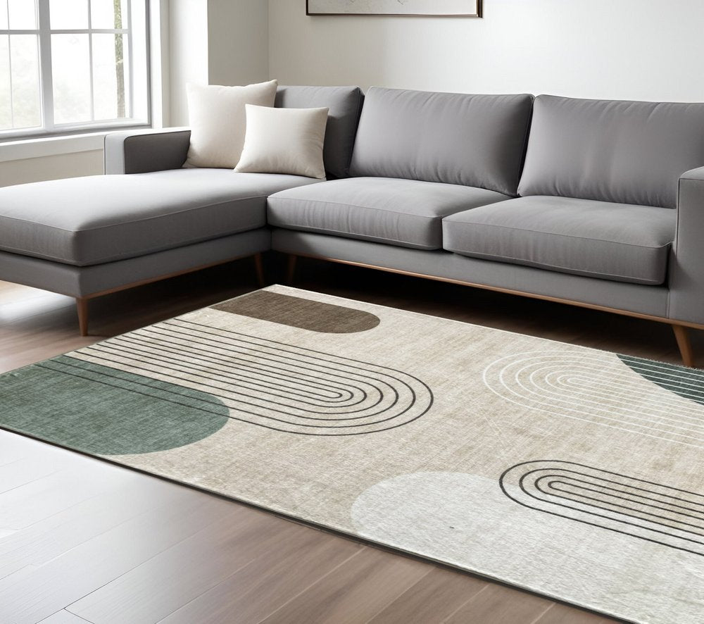 7' X 10' Beige Brown and Green Abstract Area Rug