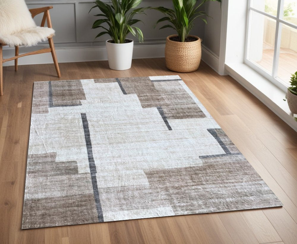4' X 6' Beige and Brown Abstract Area Rug