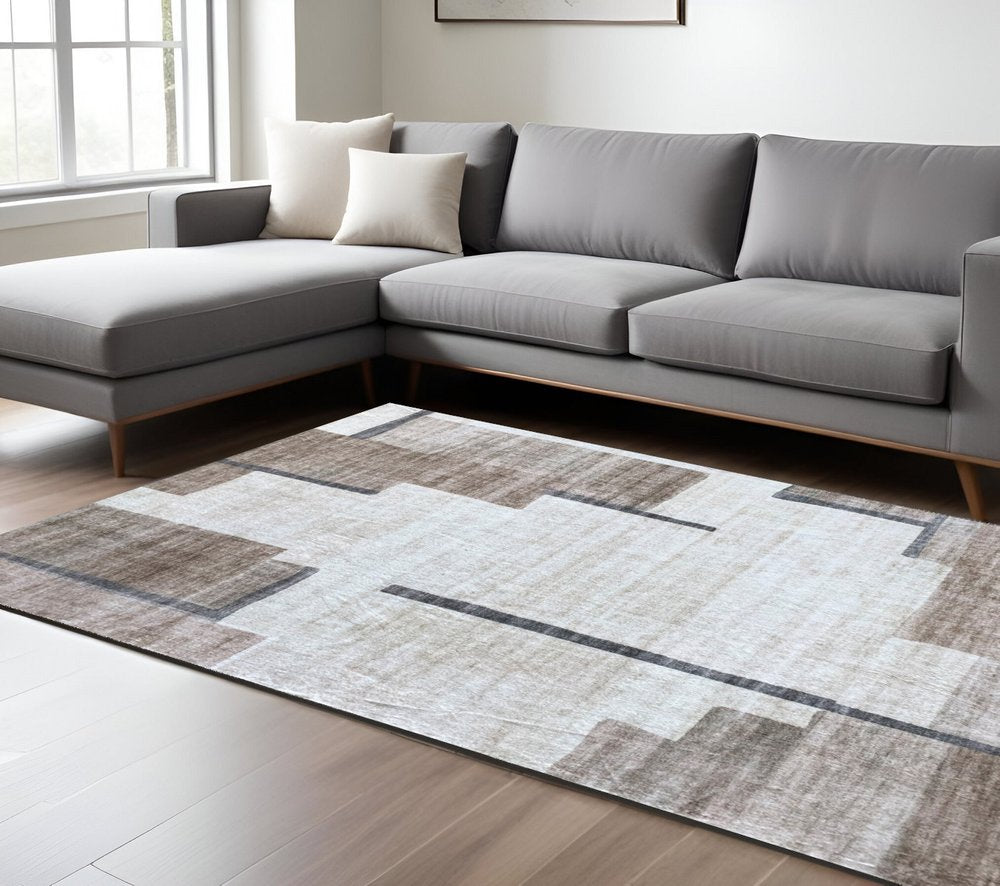 7' X 10' Beige and Brown Abstract Area Rug