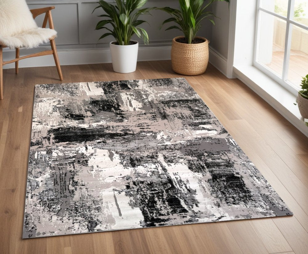 4' X 6' Black Gray and Beige Abstract Area Rug