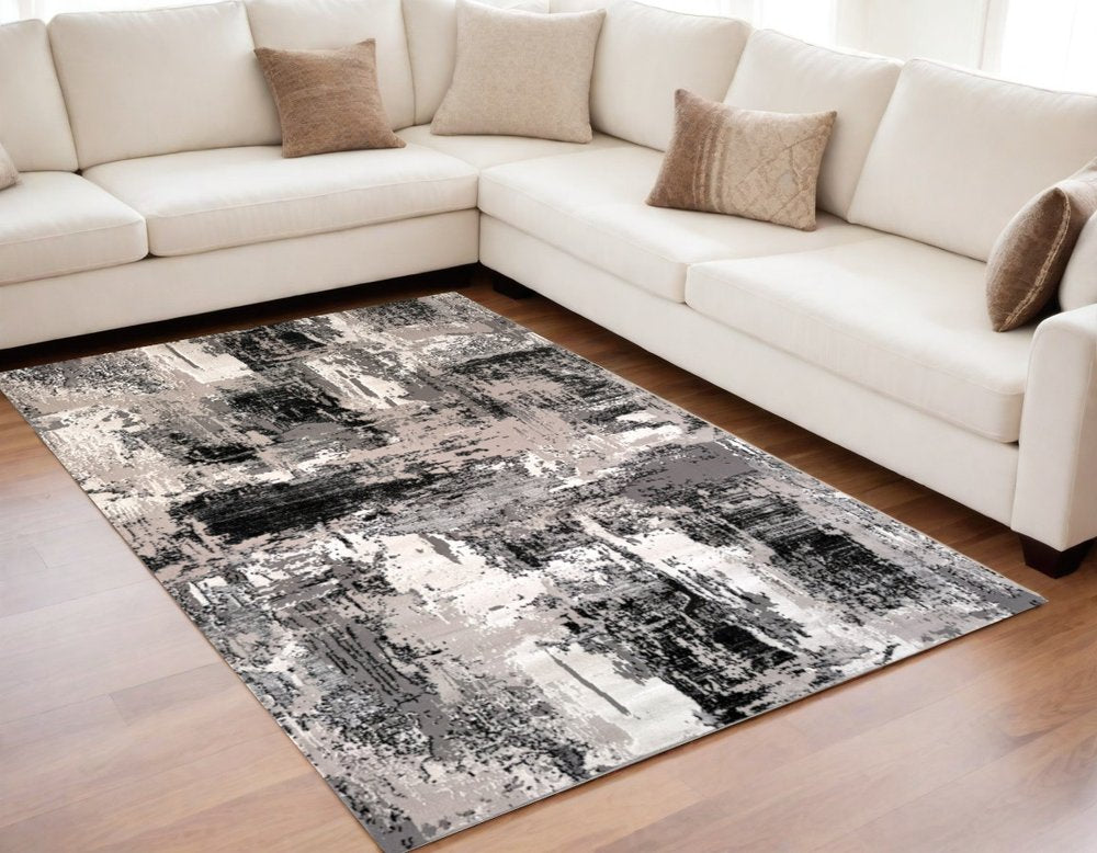 5' X 8' Black Gray and Beige Abstract Area Rug
