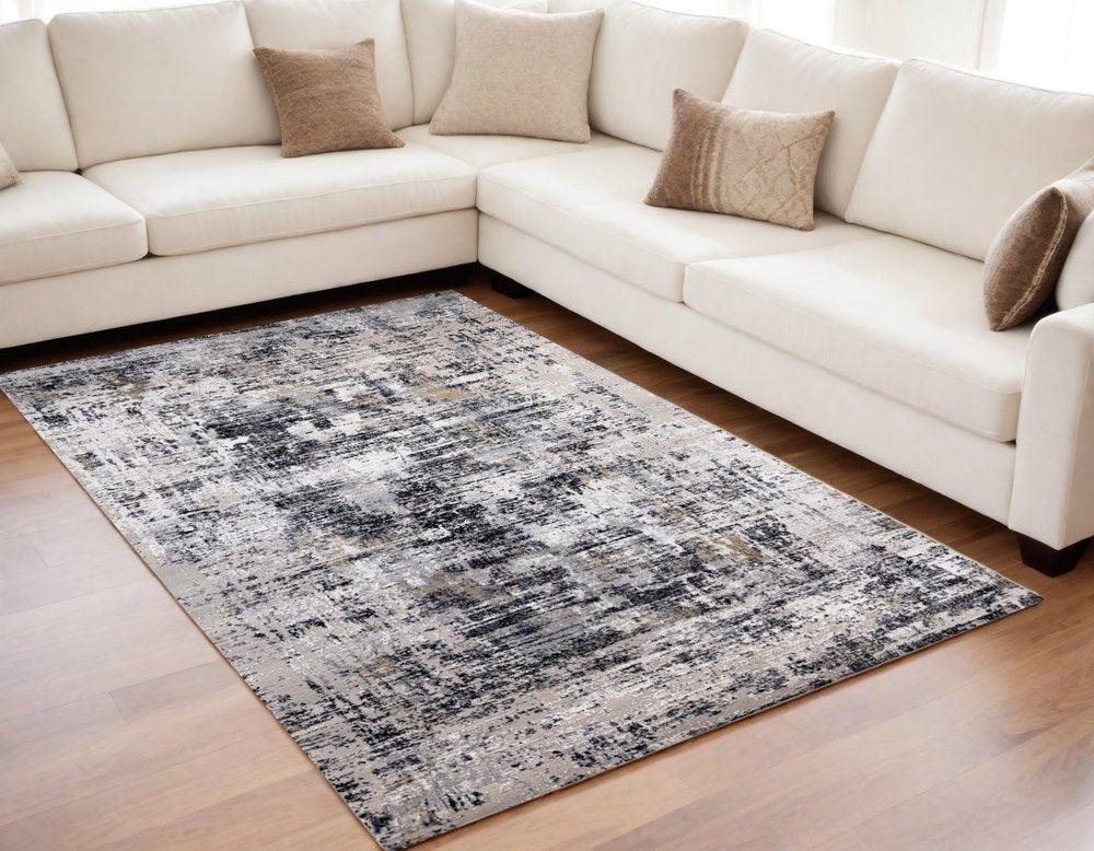 5' X 8' Beige Gray and White Abstract Area Rug