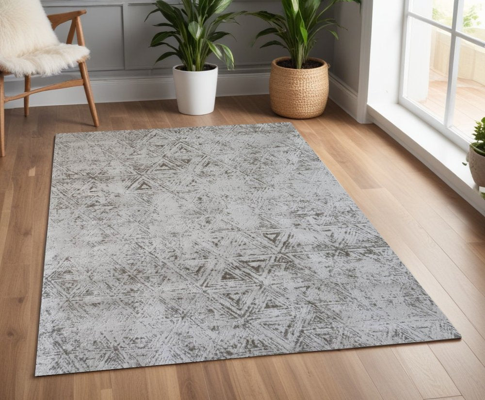 4' X 6' Cream and Beige Abstract Area Rug