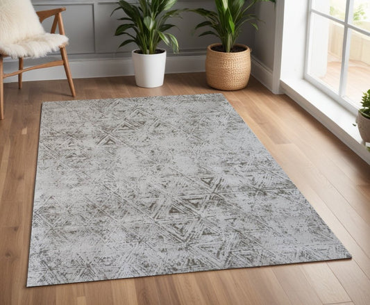 4' X 6' Cream and Beige Abstract Area Rug