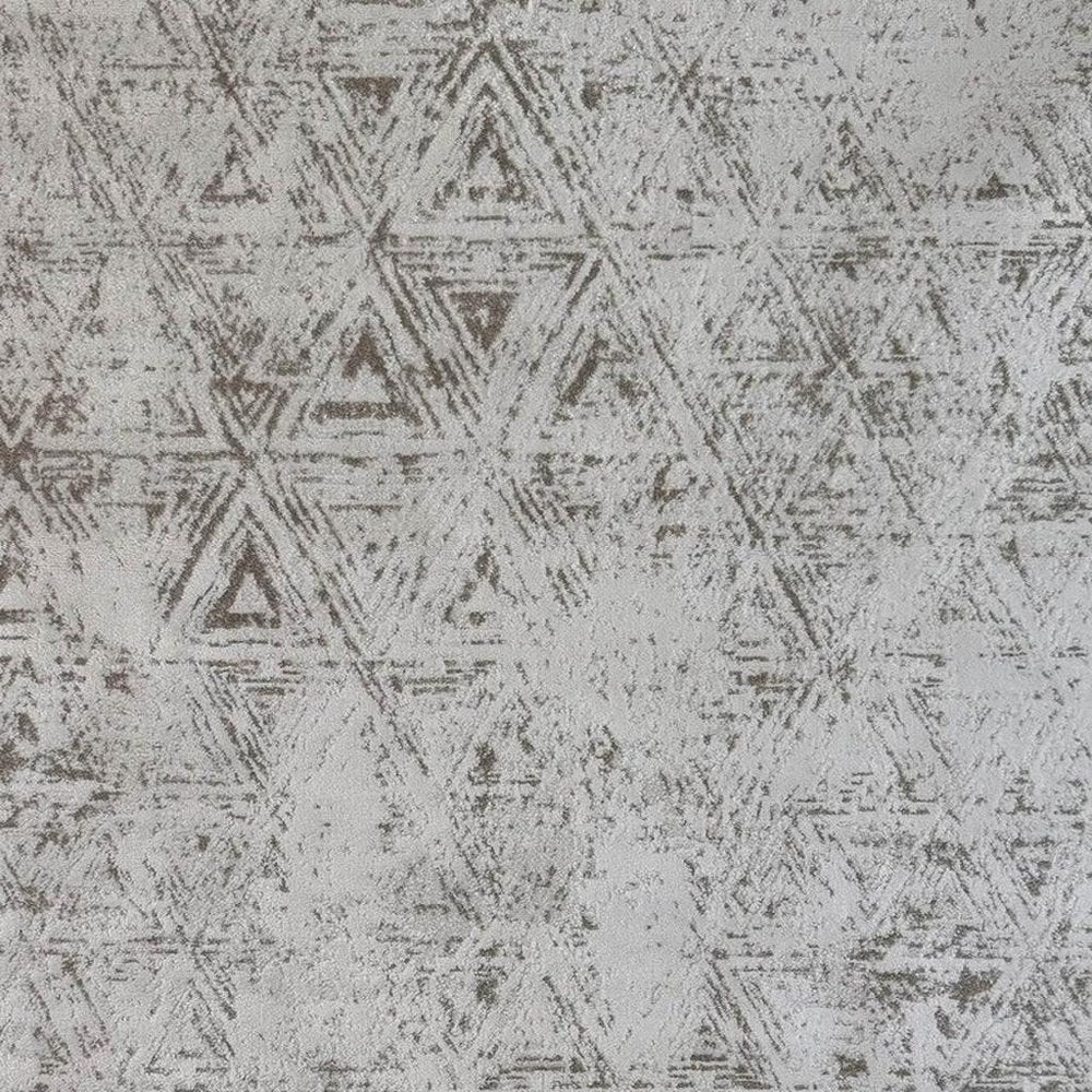 5' X 8' Cream and Beige Abstract Area Rug