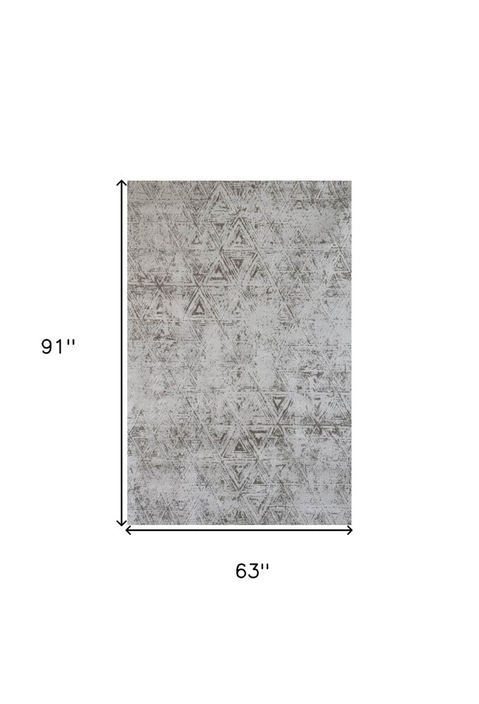 5' X 8' Cream and Beige Abstract Area Rug