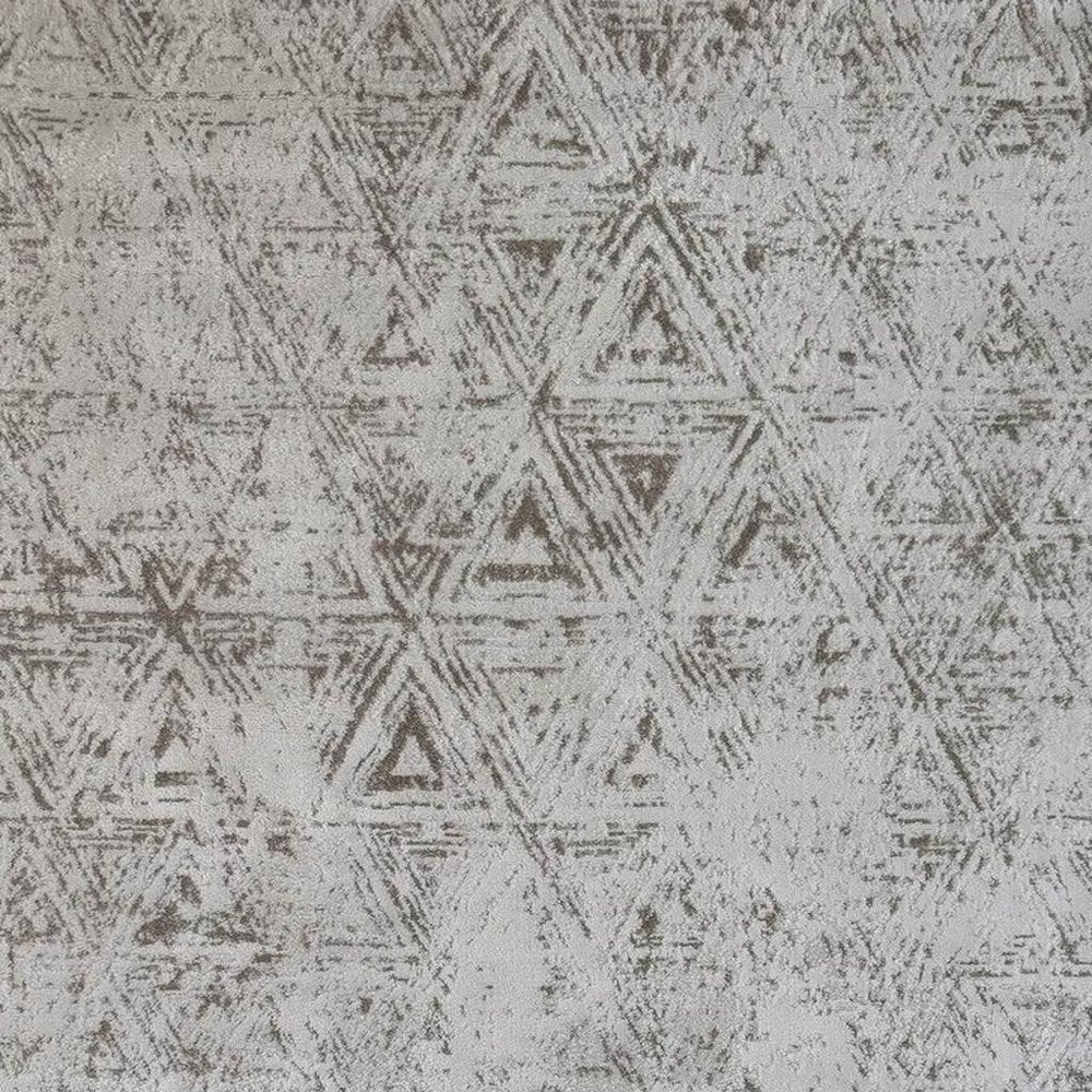 7' X 10' Cream and Beige Abstract Area Rug