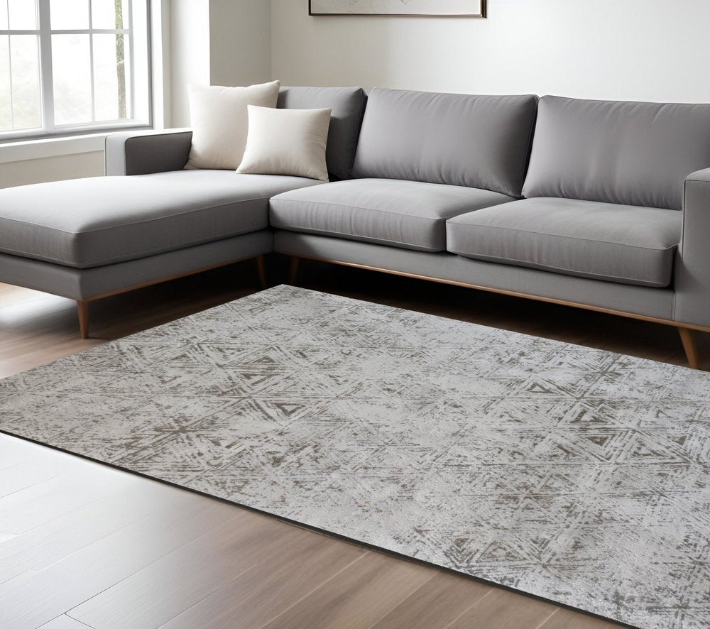 7' X 10' Cream and Beige Abstract Area Rug