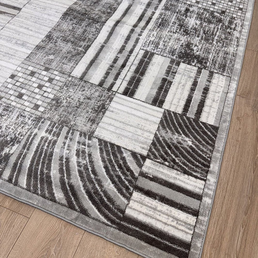 4' X 6' Gray Brown and Beige Abstract Area Rug