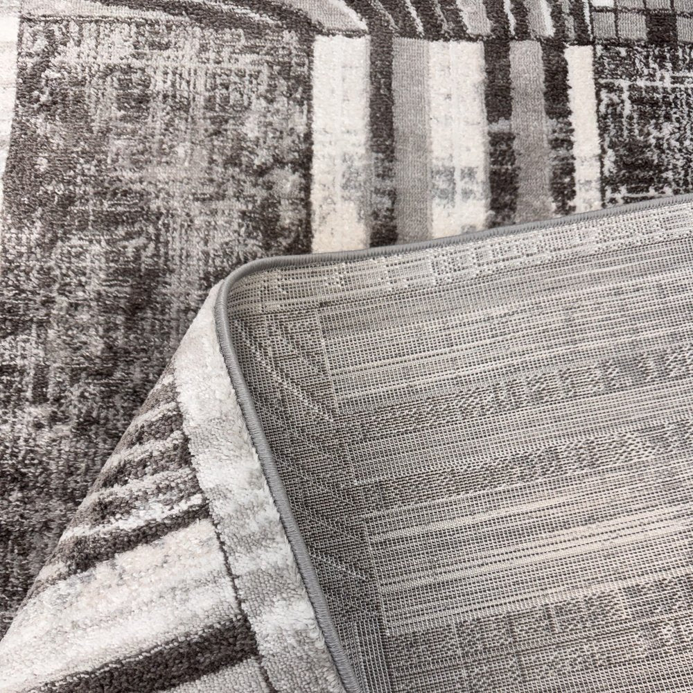 4' X 6' Gray Brown and Beige Abstract Area Rug