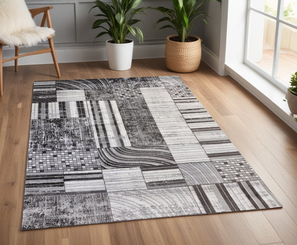 4' X 6' Gray Brown and Beige Abstract Area Rug