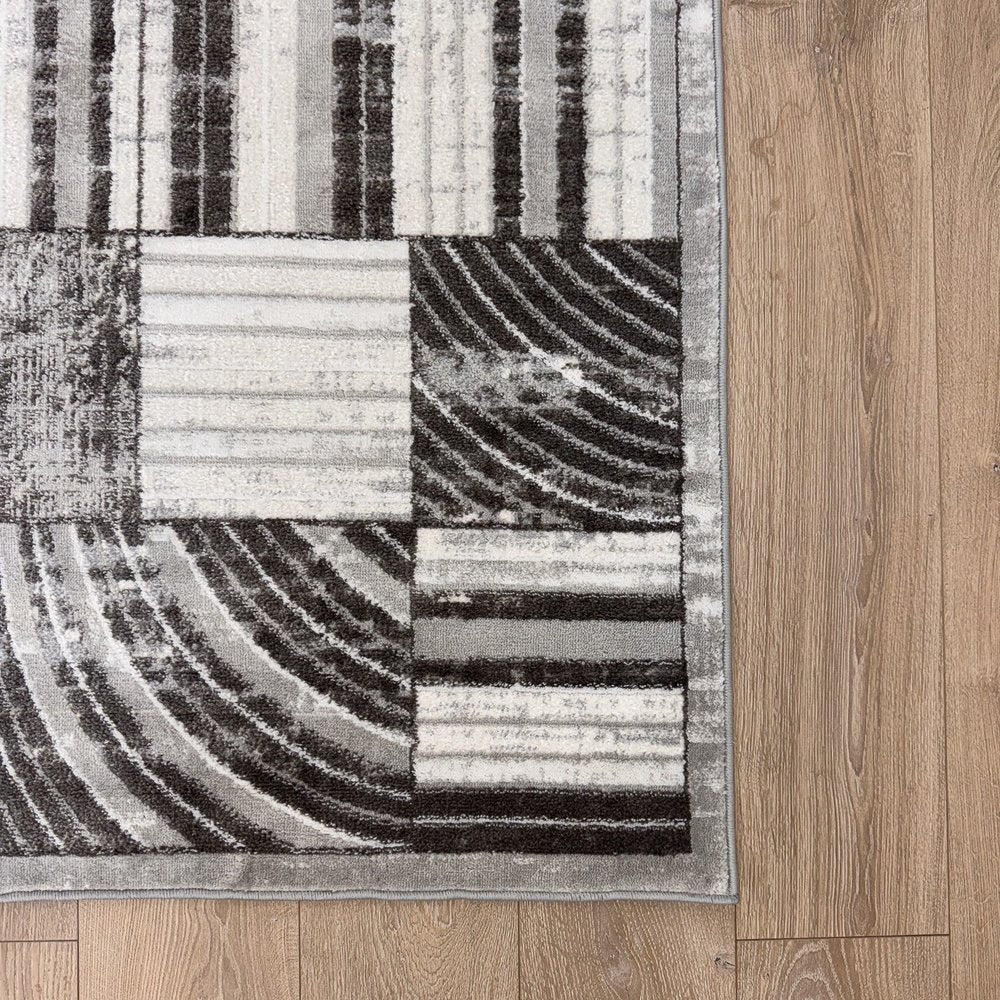 7' X 10' Gray Brown and Beige Abstract Area Rug