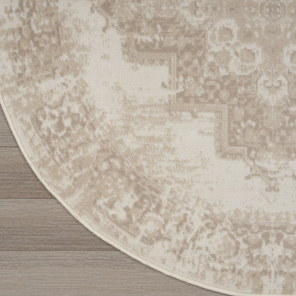 4' Ivory Floral Power Loom Worn Faded Round Rug