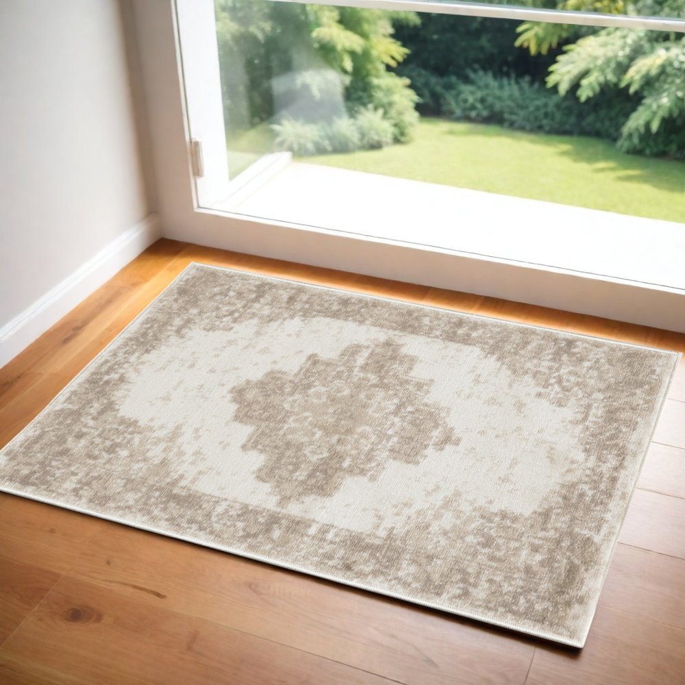 3' X 5' Ivory Floral Power Loom Worn Faded Area Rug